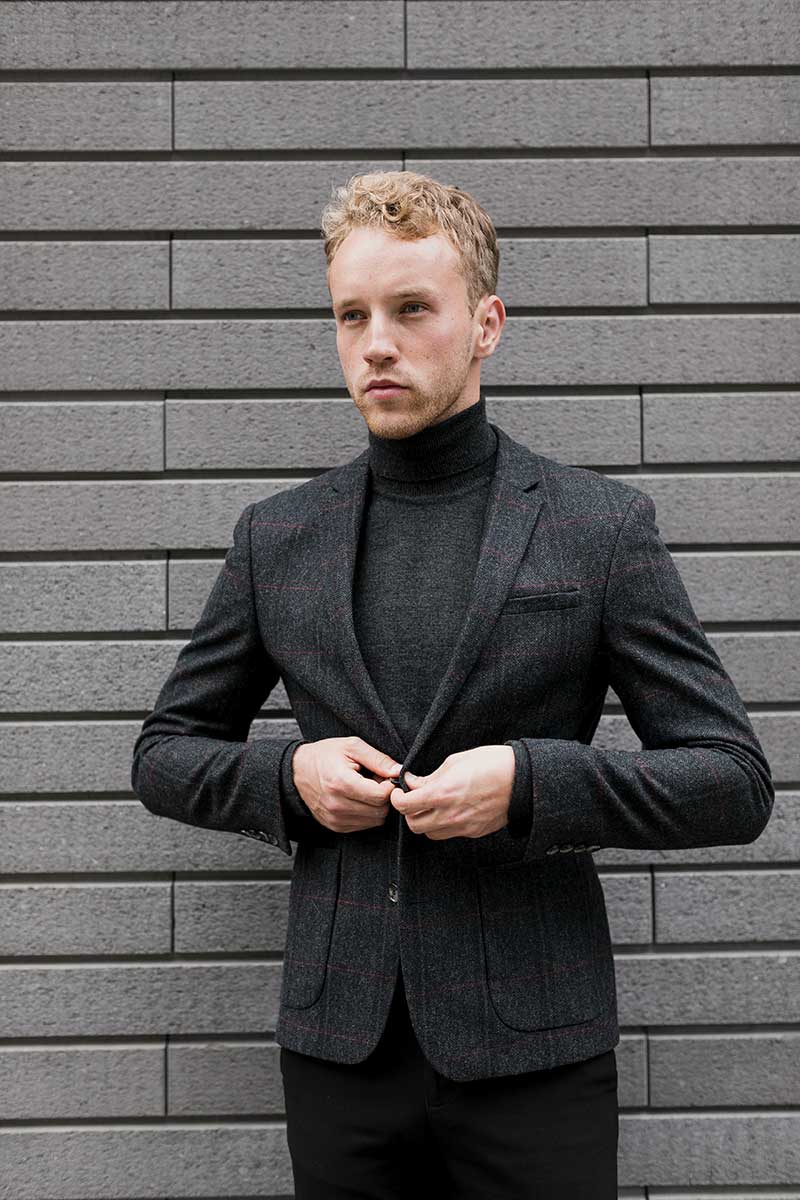 stylish-young-man-arranging-jacket